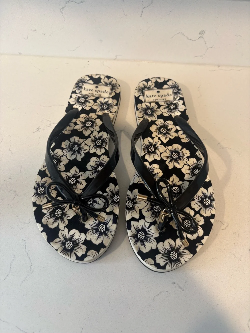 kate spade Black and Cream Floral Bow Flip Flops